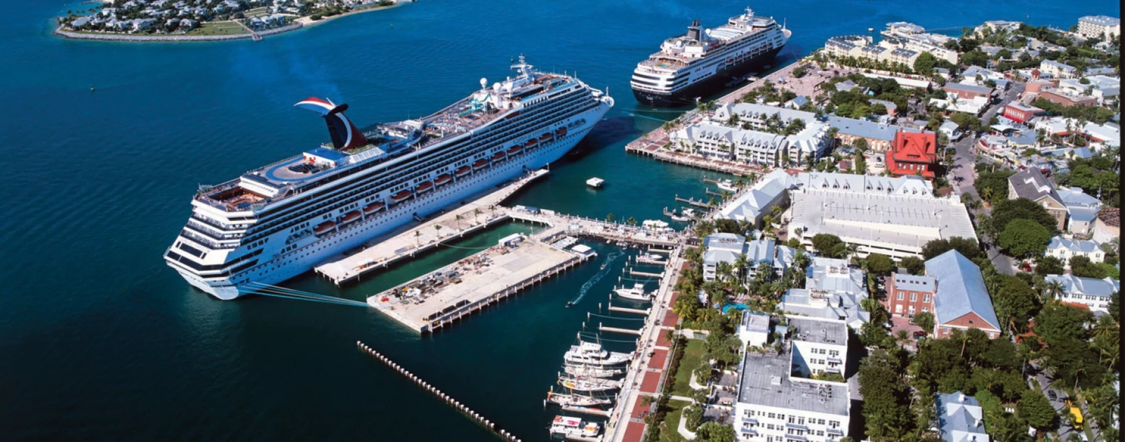 Cruise ships dock in Key West. They are the biggest vessels to cross the sanctuary and under new rules would be banned from dumping anything but cooling waters into the sanctuary.
